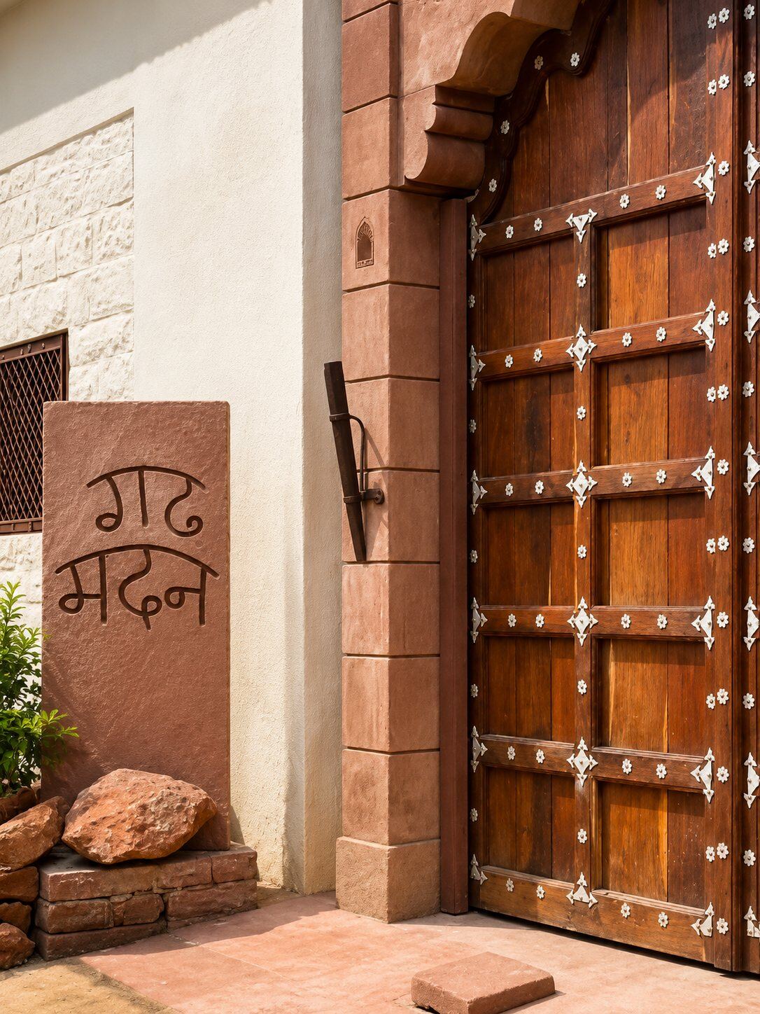 Entrance door and stone sign